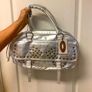 Silver purse, new with tags.
